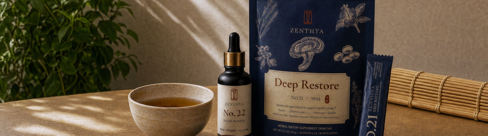 Zenthya botanical wellness products with warm tea in an evening ritual setting